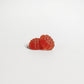 Two ViableSupps Sleep Well Gummies with a berry shape on a white background.