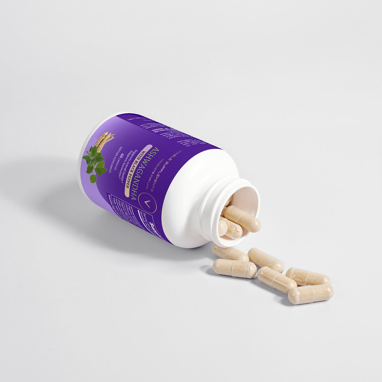 Viablesupps Ashwagandha supplement bottle tipped over with capsules spilled out, emphasizing the product's premium presentation.