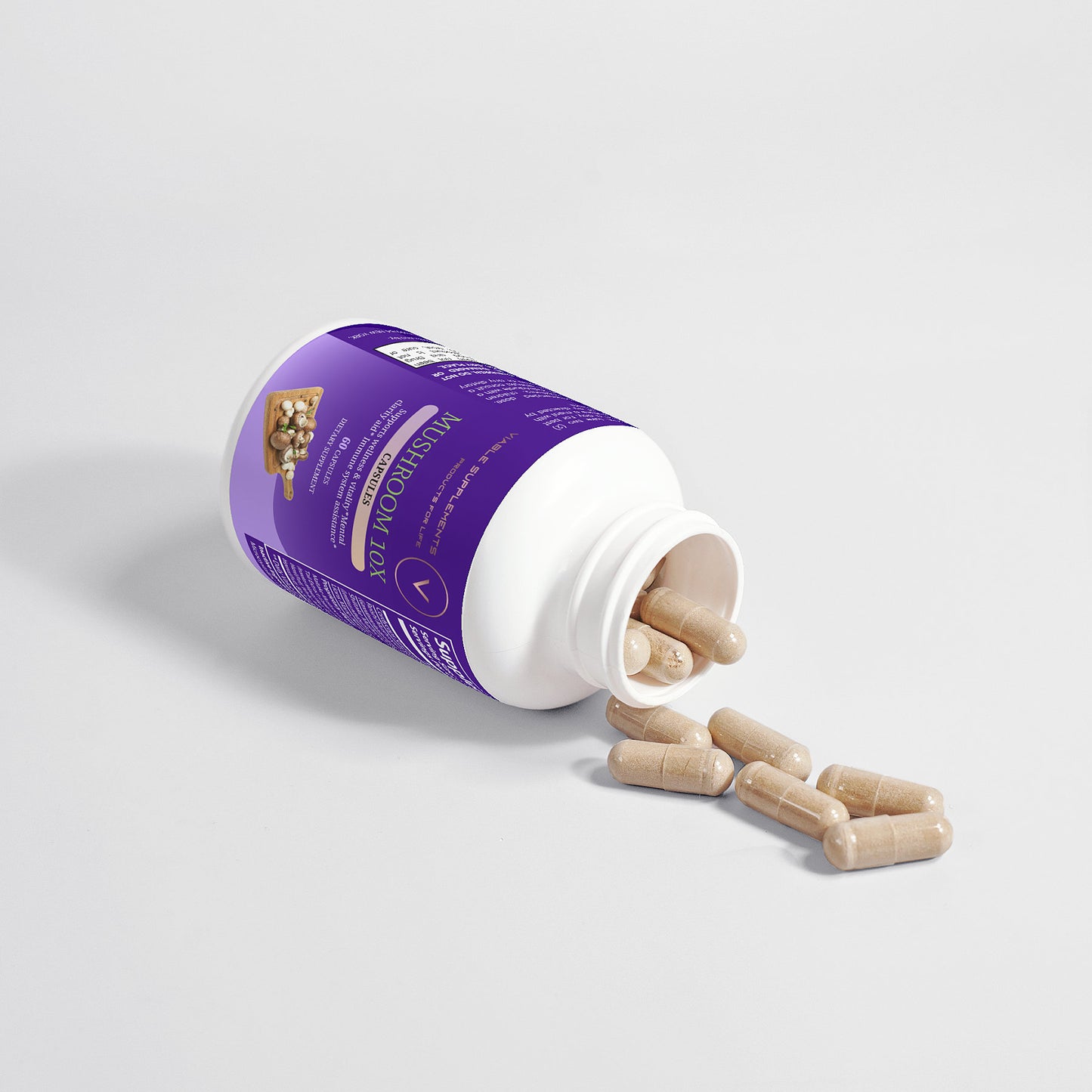 ViableSupps Mushroom 10X bottle with capsules spilled, showcasing the supplement’s premium blend for vitality and wellness.